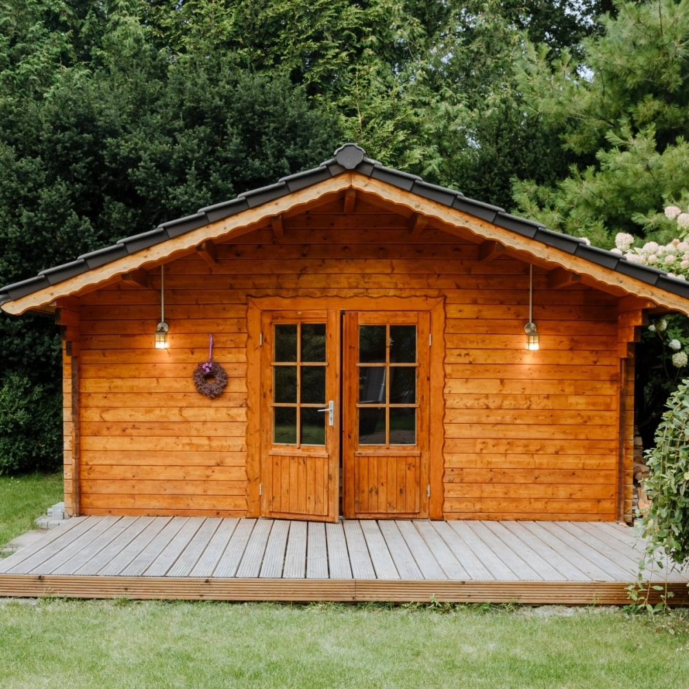 Thiết kế sân vườn nhà gỗ với tiểu cảnh nước chảy róc rách