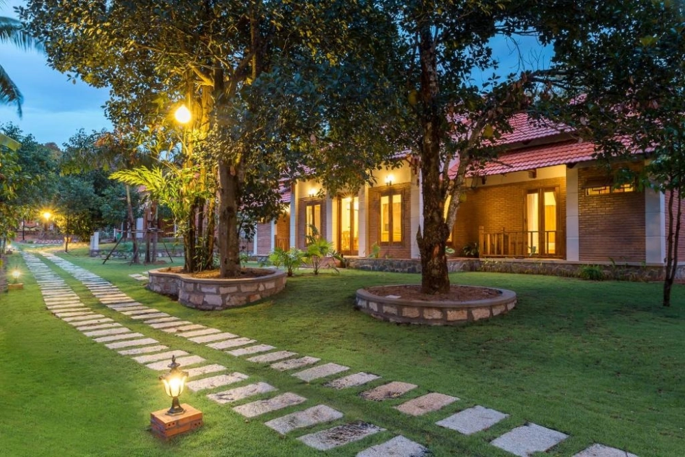 Nhà gỗ sân vườn nghỉ dưỡng mang lại cảm giác ấm cúng và gần gũi